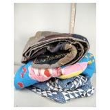 Heavily worn quilts, sleeping bag