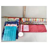 Gift wrap, plastic storage tub,