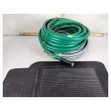 2 garden hoses, rubber mats