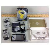 Necklace, earrings, flip phones, Sony am/fm,