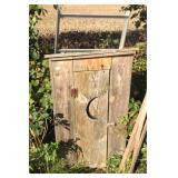 Decorative wood outhouse