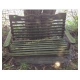 Wood porch swing converted into a bench