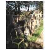 Broken chairs, peacock lawn decor