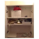 Contents of cabinets: cleaning supplies,