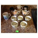 Peacock mugs, cups, creamer and sugar