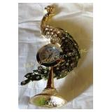 Small enameled metal and rhinestone peacock clock