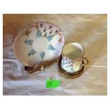 Lemoges porcelain cup and saucer with metal