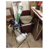 Box fan, old power drills, plastic waste bins,