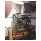 Metal shelf, Insignia TV, extension cord, caulk,