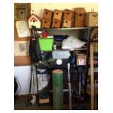 Metal shelf, bird houses, fire extinguisher, misc