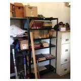 Metal shelf, books, chain, misc