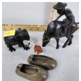 Carved wood figurines, brass shoe ashtrays