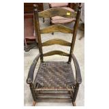 Antique ladderback rocker. 43" h x 22" w x 30" d