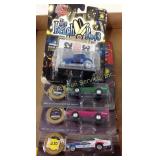 4 cars: Johnny Lightning & Racing Champions