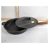 Cast iron skillet with wood handle