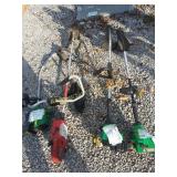 3 weed trimmers and one brush wacker