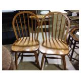 Two wooden chairs, some wear on seats