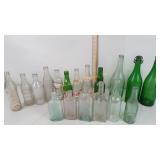 Vintage bottles including Pepsi, 7-Up, apothecary