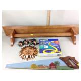 Hand-painted saw, wooden quilt rack, figurines
