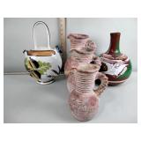 Mexican pottery one of the pitchers has some