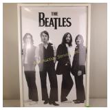 Framed picture of The Beatles with some scuffing