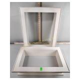 3 white shadow boxes