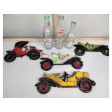 (3) soda bottles & (4) aluminum automobile wall