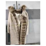 Borgana fur coat,  torn at sleeve lining