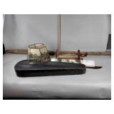 Violin case, machete, paper towel holder,