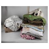Blankets, table linens, vintage stuffed dog