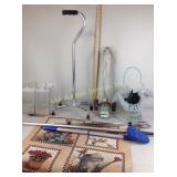 Rolling lawn sprinkler, cane, tapestry