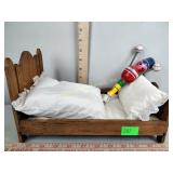 Doll bed and wooden toy