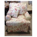 Upholstered chair and pillow