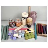 Candles including yankee candles, pink glass