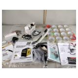 Packaging tape (new 16 rolls total), manuals, and