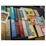 Books including readers digest and cookbooks,