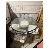 Glass top metal patio table with 4 matching