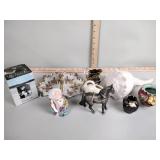 Large seashell, metal horse figurine, pottery,