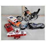 Motorcycle toys, airplane, Tonka race car,