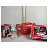 Coca-Cola collectibles: lunchbox, glasses,