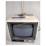Zenith  8 inch TV with remote, works, stickers on