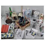 Figurines, bell, glass bottles, clear glassware,