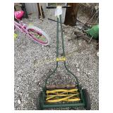 Vintage lawn mower rotary wheel