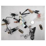 Car emblem, dice, shoestrings, and misc