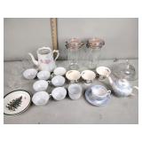 Glass kitchen canisters, Wedgewood tea cups,
