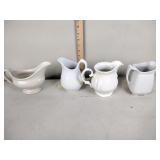 Ironstone pitchers and gravy boat