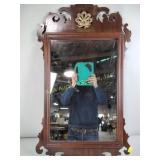 Chippendale-style mahogany mirror with some
