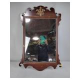 Chippendale-style mahogany mirror with some
