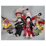 Dolls including Asian, clown , Gerber