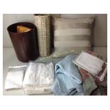 Quilted blanket, wicker umbrella stand,
